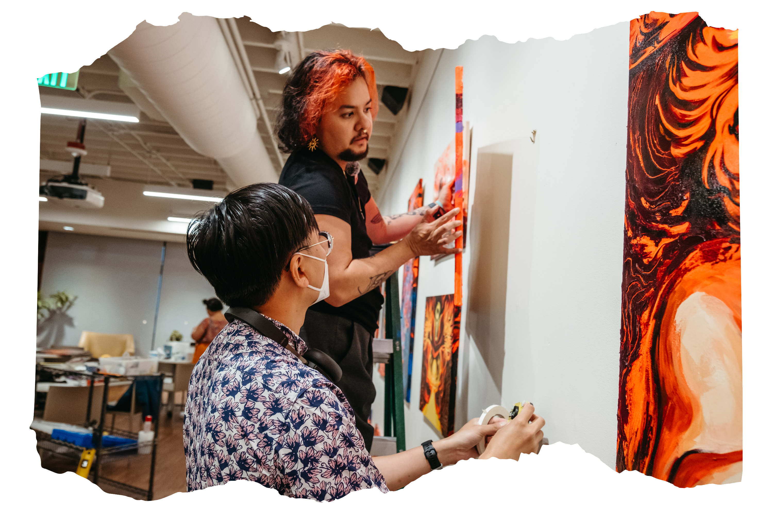 Tanza at work installing an exhibition